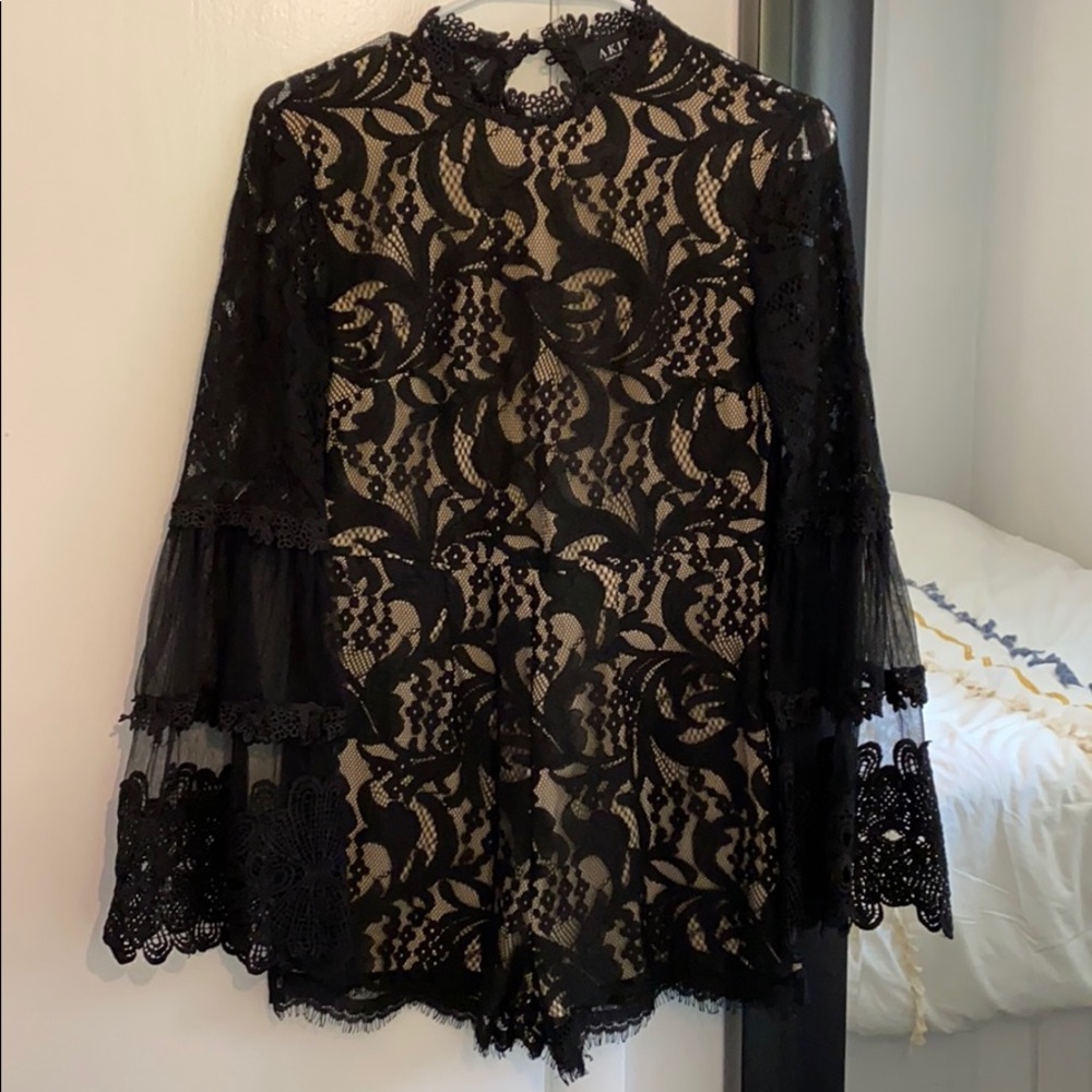 Never worn! Black lace romper size Small